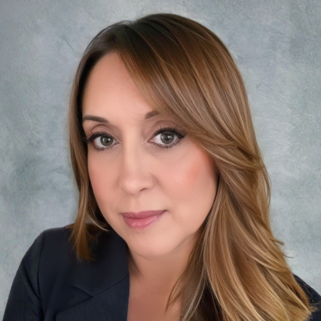 Professional headshot of woman with long hair