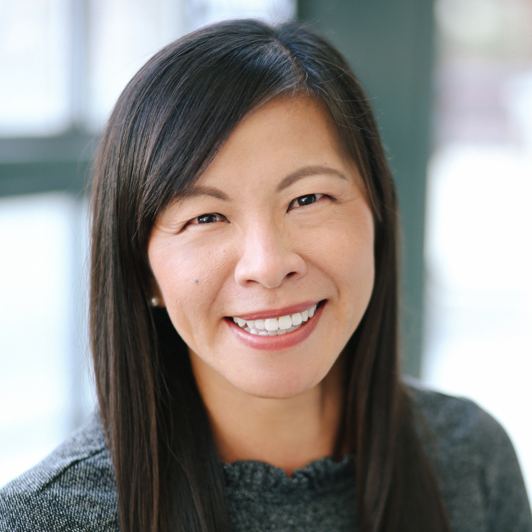 Smiling woman with long dark hair