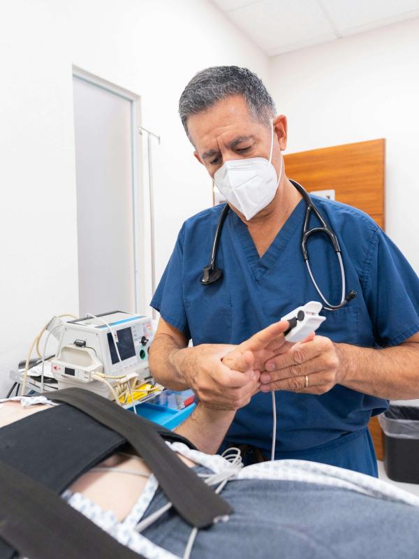 Pulse oximeter placed on patient’s finger