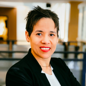 Person smiling in professional indoor portrait